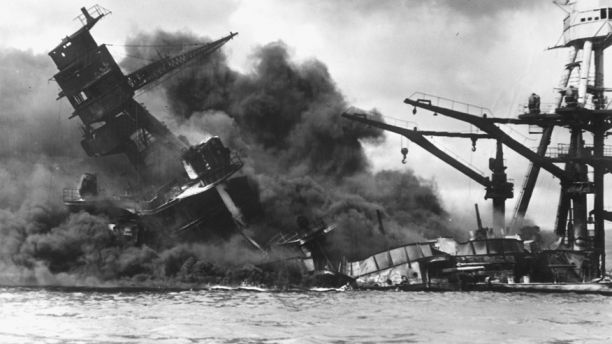 The Arizona burning after the attack on Pearl Harbor